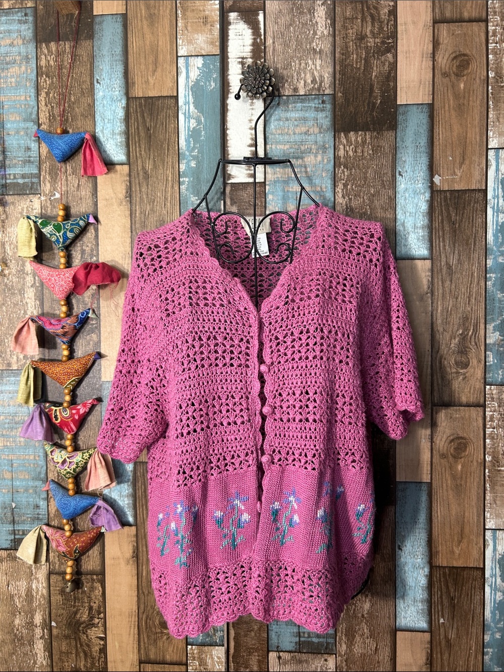 Teddi Pink Crocheted Short-Sleeve Button Cardigan with Blue Floral Embroidery